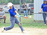 Nathan Smith cracks off a base hit. Photos by Tony Farkas