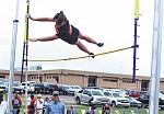 Trinity’s Shelby Walters clears the bar.
