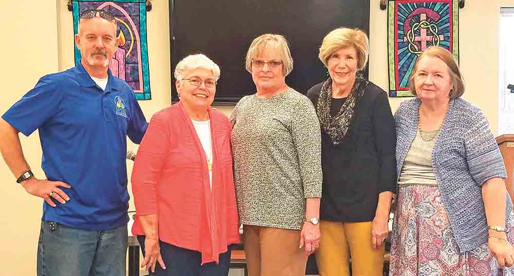 The Polk County Chapter of the American Association of University Women (AAUW) recently heard a program about the ministries offered by Center of Hope, as well as its recent merging with Empty Stocking Program and Emergency Health Board. (l-r) Mike Fortney, Virginia Key, Chris Potthoff, Genny Watkins and Peggy Wooten. Photo by Emily Banks Wooten